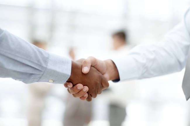 Stronger partnerships - shaking hands